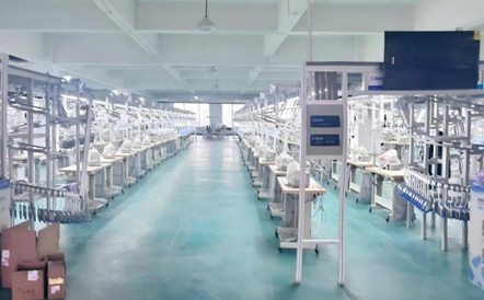 华林工贸六条智能吊挂流水线正式投产 生产效率再上新台阶